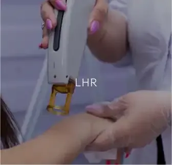 A clinician performing a laser hair removal treatment on a patient’s arm, captioned "LHR."