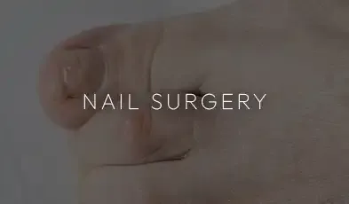 A close-up clinical photo of a patient’s hand during a nail examination, captioned "Nail Surgery."