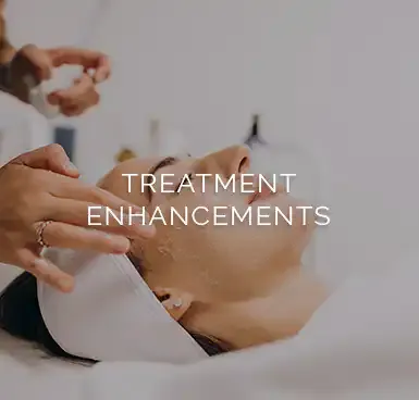 A close-up of a clinician’s gloved hands during a treatment, captioned "Treatment Enhancements."